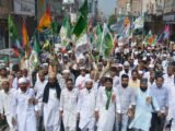 EID-MILAD-UN-NABI PROCESSION: TRICOLOUR, FLOWER SHOWERING FOSTER HARMONY
