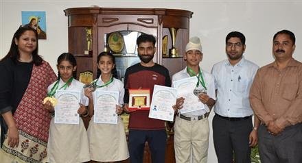 CROWNING GLORY- ANOTHER FEATHER IN THE CAP