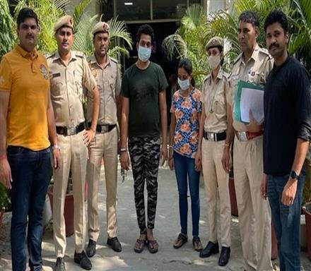 WIFE AND HER BOYFRIEND HELD FOR MURDER OF HER HUSBAND