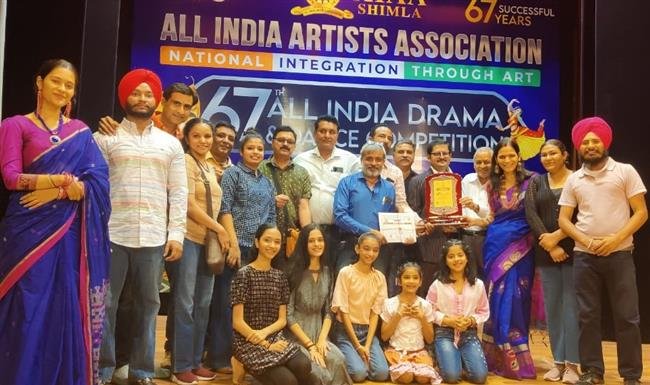 AKS PLAY TOPS IN NATIONAL COMPETITION