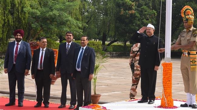 HIGH COURT CHIEF JUSTICE RAVI SHANKER JHA HOISTS TRICOLOUR
