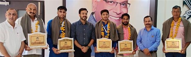 INTERNATIONAL PLAYERS, THEIR COACHES HONORED