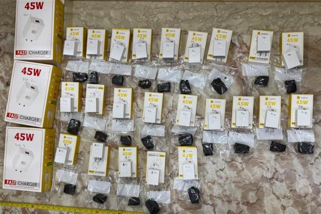 DELHI  POLICE BUSTED DRUG SYNDICATE  TWO ARRESTED WITH  HASHISH CONCEALED IN 23 MOBILE CHARGER ADAPTERS