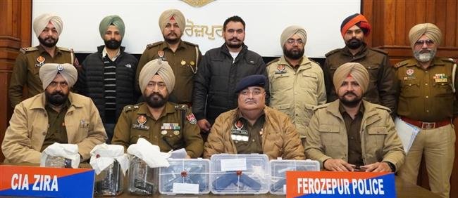 TWO NABBED WITH ARMS AND AMMUNITION