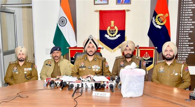 CROSS-BORDER NARCO-SMUGGLING NETWORK BUSTED IN AMRITSAR; TWO HELD WITH 7.6KG HEROIN, ₹21K DRUG MONEY